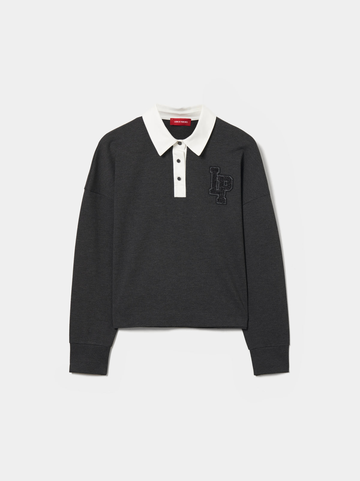 Polo de manga larga con cuello en contraste