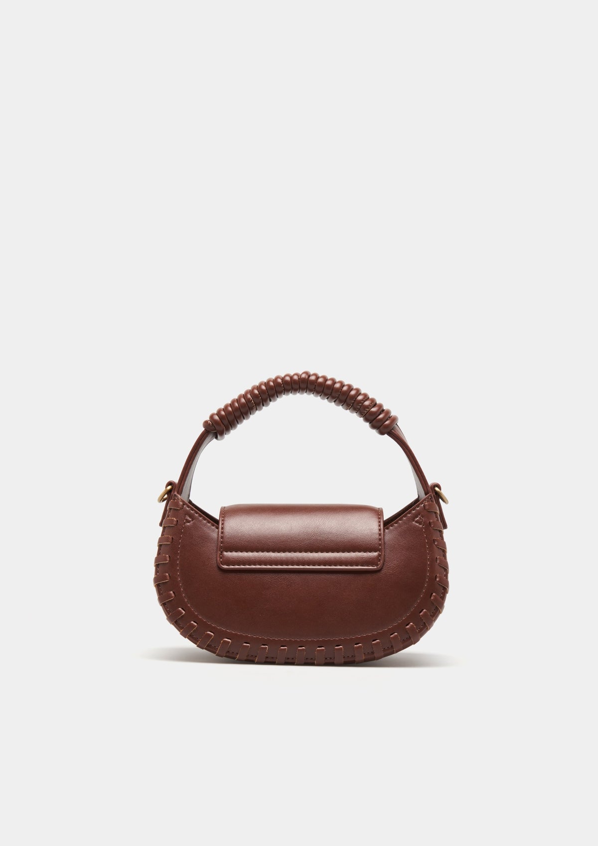 Compacto y lleno de estilo, este mini bolso de mano presenta un diseño estructurado con asa superior esférica y un elegante aplique.