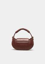 Compacto y lleno de estilo, este mini bolso de mano presenta un diseño estructurado con asa superior esférica y un elegante aplique.