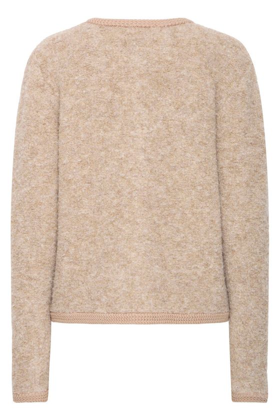 Textura suave y esponjosa del tejido de punto beige