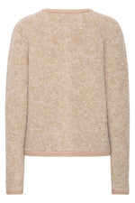 Textura suave y esponjosa del tejido de punto beige