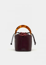 Mini bolso tipo cubo de mujer con forma de flor y asa de resina. Elegante, versátil y con cierre de cremallera para un estilo único.