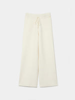 Pantalón de punto crudo de pierna ancha con cintura elástica y cordón ajustable, vista frontal