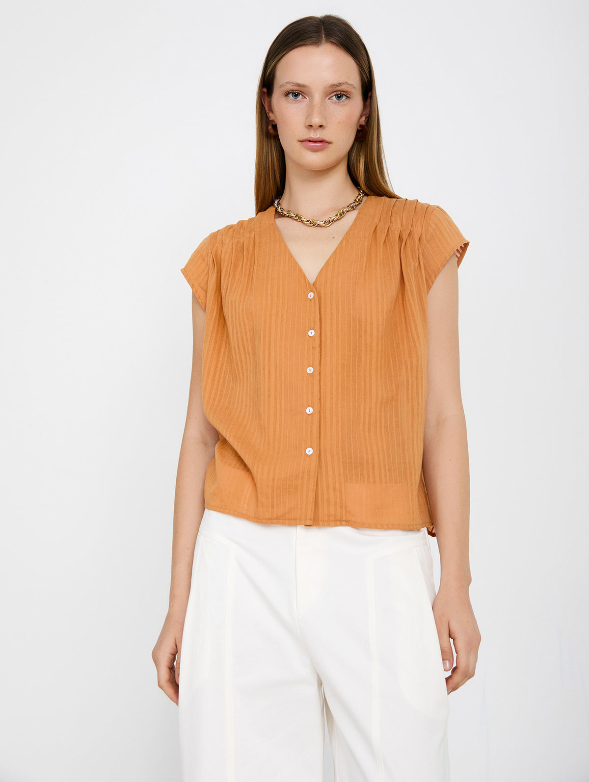 Blusa de Algodón con Rayas en Relieve y Escote Pico