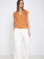 Blusa de Algodón con Rayas en Relieve y Escote Pico