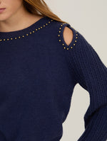 Detalle de manga trenzada con textura artesanal