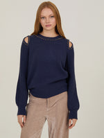 Detalle de manga trenzada con textura artesanal