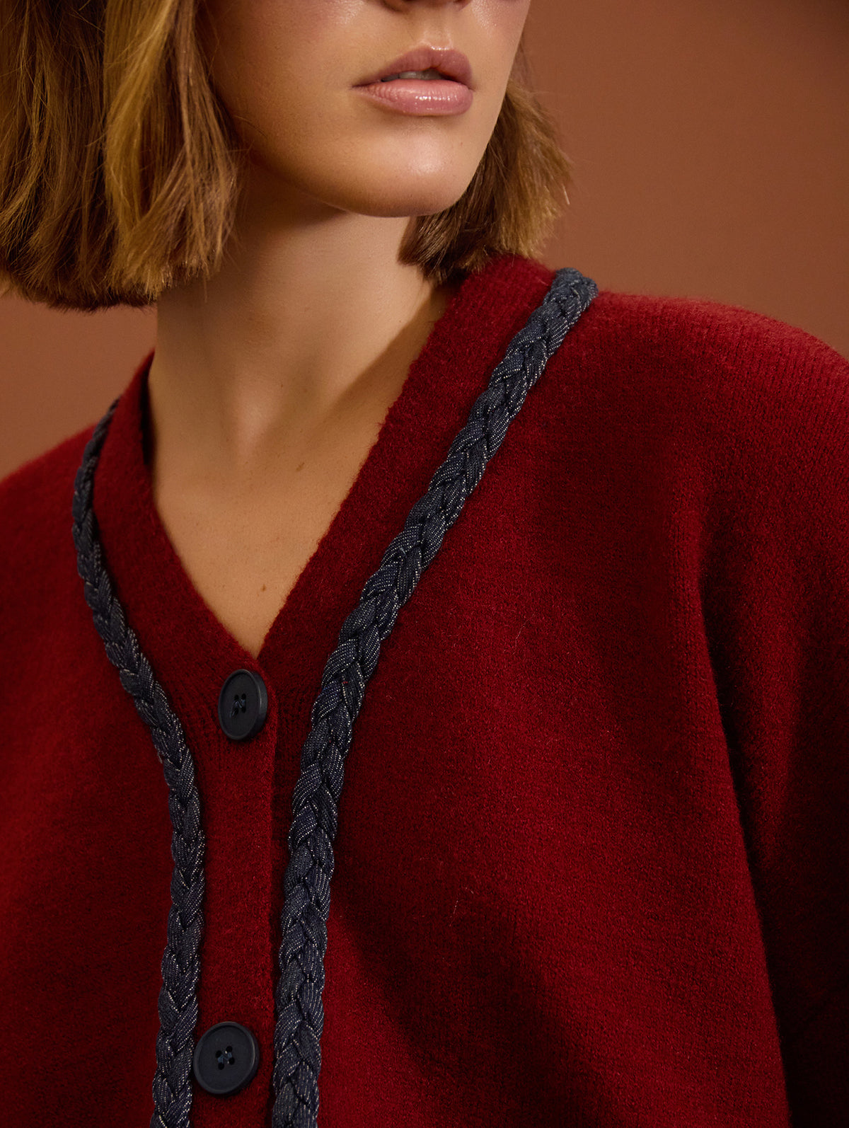 CARDIGAN PUNTO CON VIVO TRENZADO
