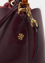 Mini bolso tipo cubo de mujer con forma de flor y asa de resina. Elegante, versátil y con cierre de cremallera para un estilo único.