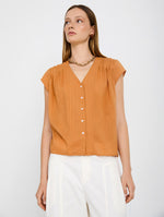 Blusa de Algodón con Rayas en Relieve y Escote Pico
