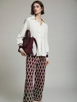 BOLSO EFECTO PIEL CON ESTRUCUTRA ENTRELAZADA
