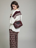 BOLSO EFECTO PIEL CON ESTRUCUTRA ENTRELAZADA