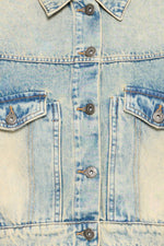Chaqueta vaquera cropped efecto desgastado